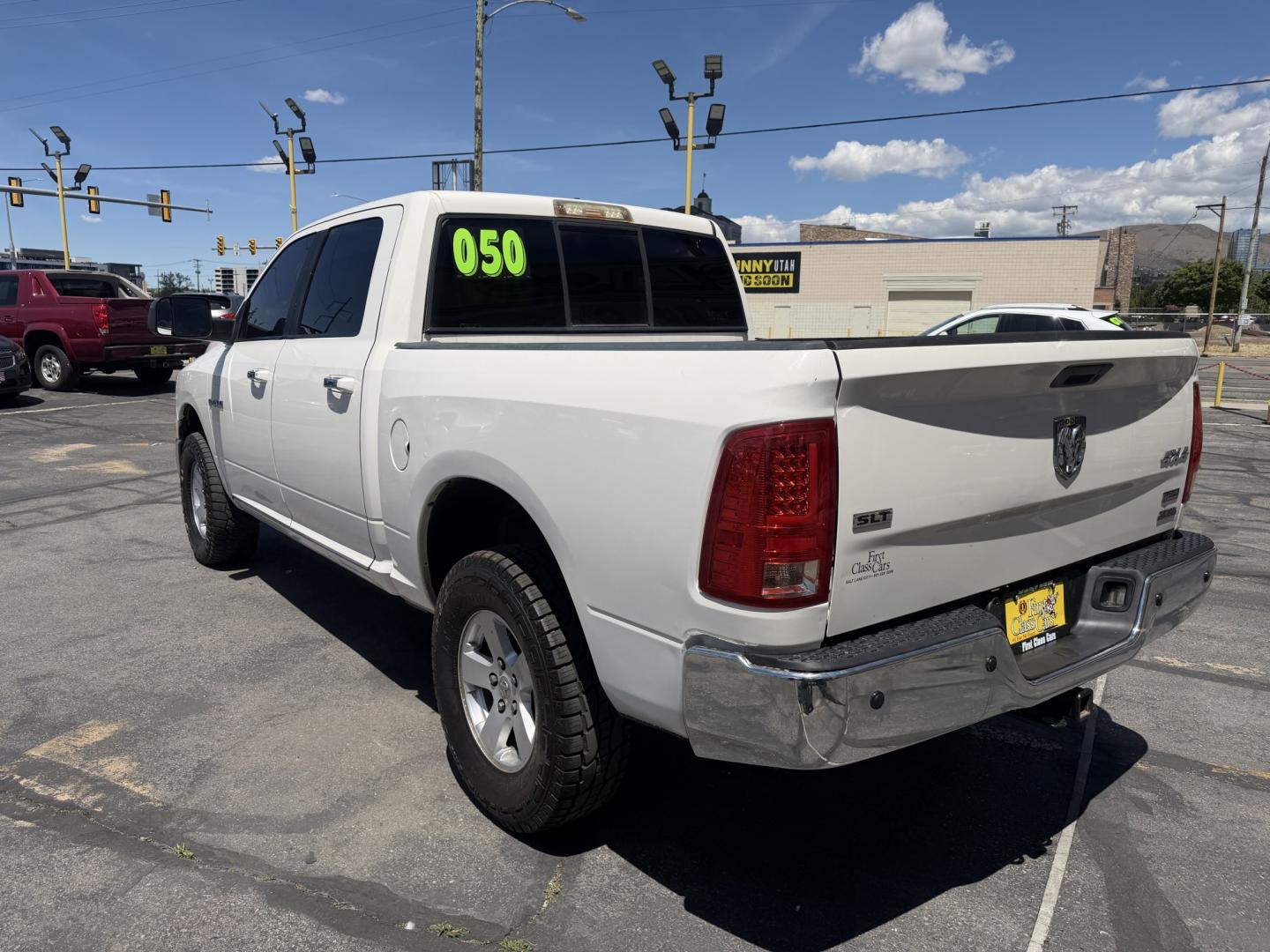2009 Super White /Tan Dodge Ram 1500 SLT Crew Cab 4WD (1D3HV13P49S) with an 4.7L V8 SOHC 16V FFV engine, 5-Speed Automatic transmission, located at 801 South State Street, Salt Lake City, UT, 84111, (801) 328-0098, 40.751953, -111.888206 - Seats up to 6 People! Folding Armrest! Clean Title! Clean Carfax! Carfax shows regular service was performed and maintained. Nice affordable 4x4 truck great summer time truck for towing or winter truck for 4x4 as well! Passed all inspections already by a certified mechanic and has been approved for - Photo#11