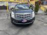 2012 Sterling Gray Metallic /Black Cadillac SRX Premium (3GYFNCE38CS) with an 3.6L V6 DOHC 24V FFV engine, 6-Speed Automatic transmission, located at 801 South State Street, Salt Lake City, UT, 84111, (801) 328-0098, 40.751953, -111.888206 - Clean Title! Clean Carfax! Carfax shows no accidents and regular service was performed and maintained. Beautiful 2012 Cadillac SRX Premium loaded with luxury options and comfort features! Great luxury SUV for commuting, road trips, or winter driving with plenty of space and premium styling. Passed a - Photo#1