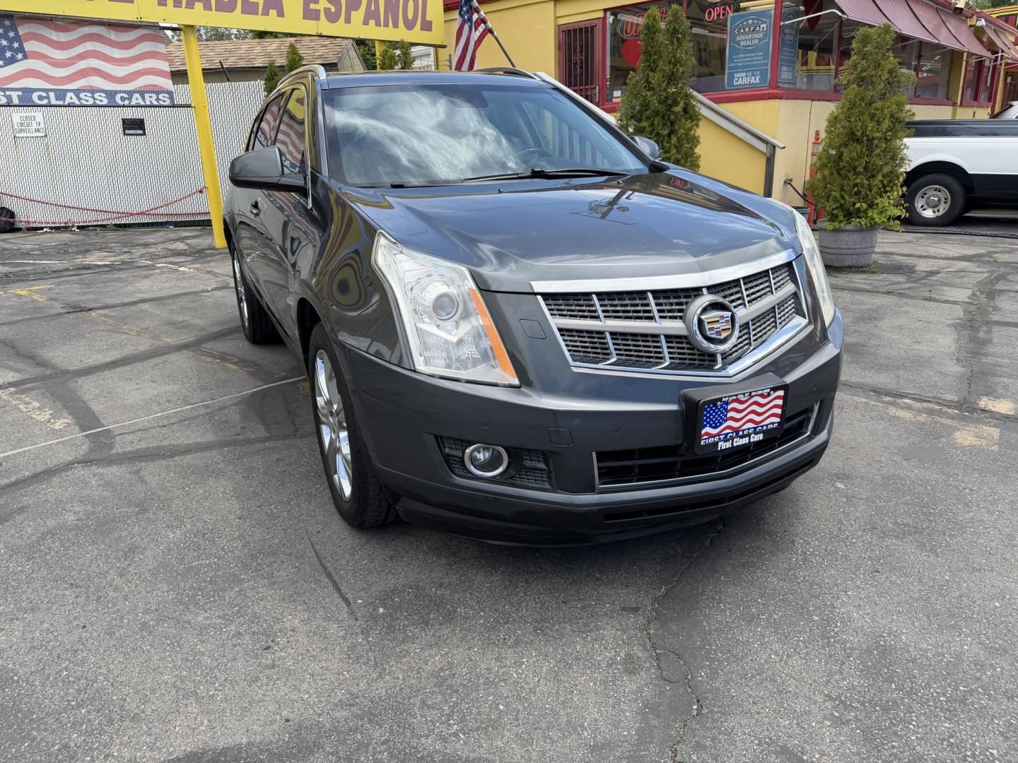 2012 Sterling Gray Metallic /Black Cadillac SRX Premium (3GYFNCE38CS) with an 3.6L V6 DOHC 24V FFV engine, 6-Speed Automatic transmission, located at 801 South State Street, Salt Lake City, UT, 84111, (801) 328-0098, 40.751953, -111.888206 - Clean Title! Clean Carfax! Carfax shows no accidents and regular service was performed and maintained. Beautiful 2012 Cadillac SRX Premium loaded with luxury options and comfort features! Great luxury SUV for commuting, road trips, or winter driving with plenty of space and premium styling. Passed a - Photo#2