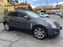 2012 Sterling Gray Metallic /Black Cadillac SRX Premium (3GYFNCE38CS) with an 3.6L V6 DOHC 24V FFV engine, 6-Speed Automatic transmission, located at 801 South State Street, Salt Lake City, UT, 84111, (801) 328-0098, 40.751953, -111.888206 - Clean Title! Clean Carfax! Carfax shows no accidents and regular service was performed and maintained. Beautiful 2012 Cadillac SRX Premium loaded with luxury options and comfort features! Great luxury SUV for commuting, road trips, or winter driving with plenty of space and premium styling. Passed a - Photo#4