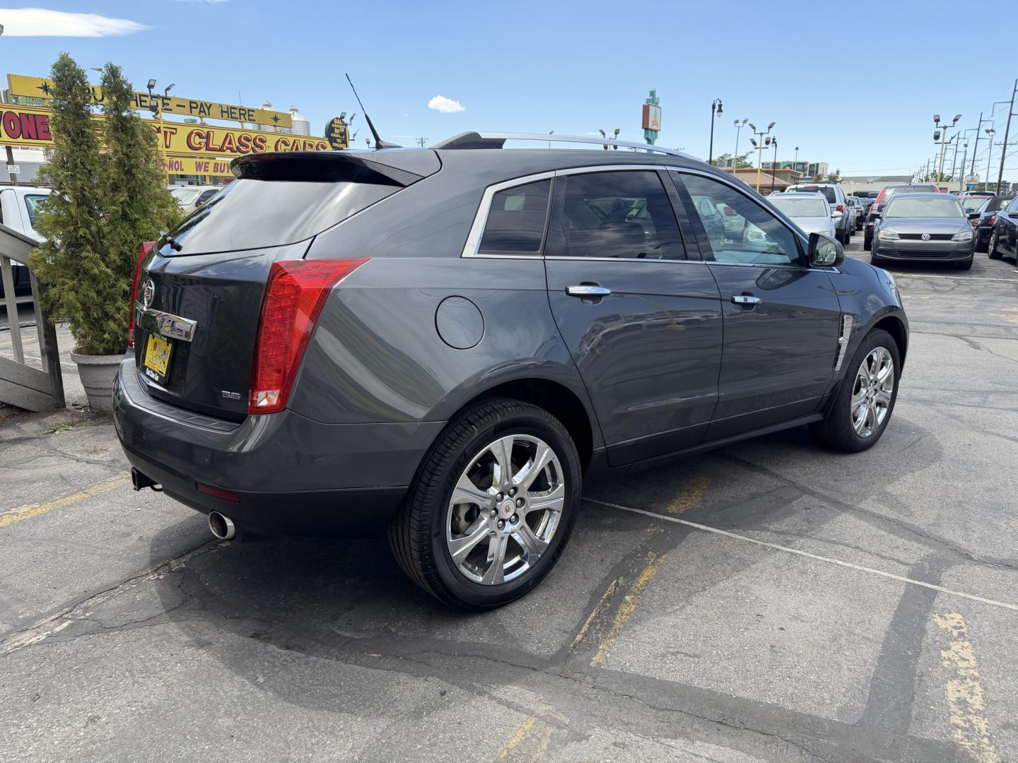 2012 Sterling Gray Metallic /Black Cadillac SRX Premium (3GYFNCE38CS) with an 3.6L V6 DOHC 24V FFV engine, 6-Speed Automatic transmission, located at 801 South State Street, Salt Lake City, UT, 84111, (801) 328-0098, 40.751953, -111.888206 - Clean Title! Clean Carfax! Carfax shows no accidents and regular service was performed and maintained. Beautiful 2012 Cadillac SRX Premium loaded with luxury options and comfort features! Great luxury SUV for commuting, road trips, or winter driving with plenty of space and premium styling. Passed a - Photo#6