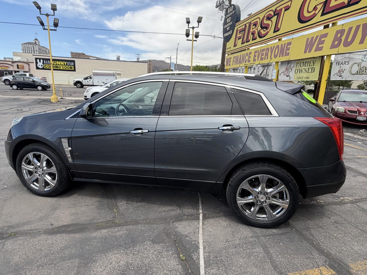 2012 Sterling Gray Metallic /Black Cadillac SRX Premium (3GYFNCE38CS) with an 3.6L V6 DOHC 24V FFV engine, 6-Speed Automatic transmission, located at 801 South State Street, Salt Lake City, UT, 84111, (801) 328-0098, 40.751953, -111.888206 - Clean Title! Clean Carfax! Carfax shows no accidents and regular service was performed and maintained. Beautiful 2012 Cadillac SRX Premium loaded with luxury options and comfort features! Great luxury SUV for commuting, road trips, or winter driving with plenty of space and premium styling. Passed a - Photo#11