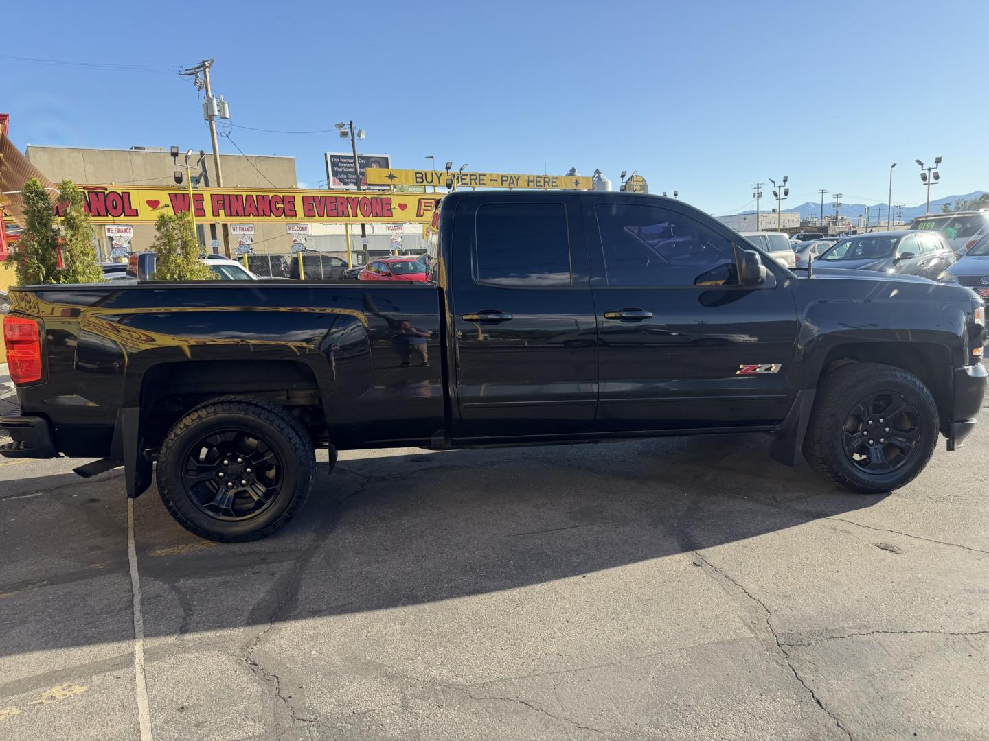2017 Black /Black Chevrolet Silverado 1500 Z71 LT Double Cab 4WD (1GCVKREC2HZ) with an 5.3L V8 OHV 16V engine, 6A transmission, located at 801 South State Street, Salt Lake City, UT, 84111, (801) 328-0098, 40.751953, -111.888206 - Seats up to 6 People! Folding Armrest! Clean Title! Clean Carfax! Carfax shows no accidents and only 2 previous owners. This truck was a new car dealer trade-in and has been regularly serviced and maintained. Absolutely immaculate 2017 Chevrolet Silverado 1500 LT with the highly desirable Z71 Packag - Photo#7