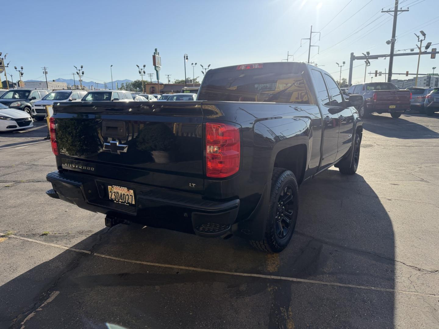 2017 Black /Black Chevrolet Silverado 1500 Z71 LT Double Cab 4WD (1GCVKREC2HZ) with an 5.3L V8 OHV 16V engine, 6A transmission, located at 801 South State Street, Salt Lake City, UT, 84111, (801) 328-0098, 40.751953, -111.888206 - Seats up to 6 People! Folding Armrest! Clean Title! Clean Carfax! Carfax shows no accidents and only 2 previous owners. This truck was a new car dealer trade-in and has been regularly serviced and maintained. Absolutely immaculate 2017 Chevrolet Silverado 1500 LT with the highly desirable Z71 Packag - Photo#9