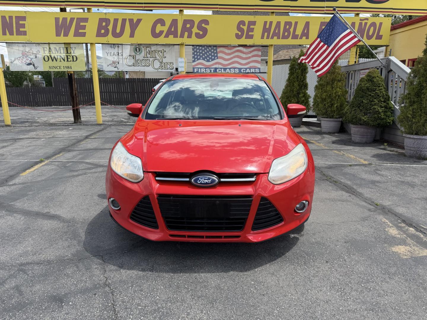 2012 Salsa Red Pearl /Tan Ford Focus SEL (1FAHP3M21CL) with an 2.0L L4 DOHC 16V engine, 6-Speed Automatic transmission, located at 801 South State Street, Salt Lake City, UT, 84111, (801) 328-0098, 40.751953, -111.888206 - Clean Title! Clean Carfax! Carfax shows only 2 previous owners and regular service was performed and maintained. Nice reliable and fuel efficient 2012 Ford Focus SEL with the dependable 2.0L 4 Cylinder engine! Great commuter car, first car, or affordable daily driver with a comfortable interior and - Photo#2
