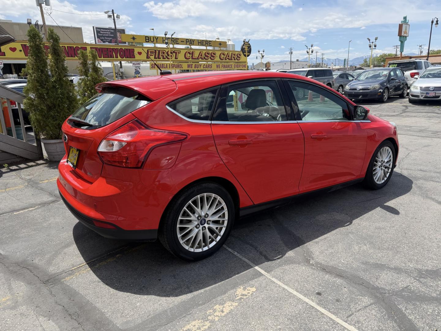 2012 Salsa Red Pearl /Tan Ford Focus SEL (1FAHP3M21CL) with an 2.0L L4 DOHC 16V engine, 6-Speed Automatic transmission, located at 801 South State Street, Salt Lake City, UT, 84111, (801) 328-0098, 40.751953, -111.888206 - Clean Title! Clean Carfax! Carfax shows only 2 previous owners and regular service was performed and maintained. Nice reliable and fuel efficient 2012 Ford Focus SEL with the dependable 2.0L 4 Cylinder engine! Great commuter car, first car, or affordable daily driver with a comfortable interior and - Photo#5