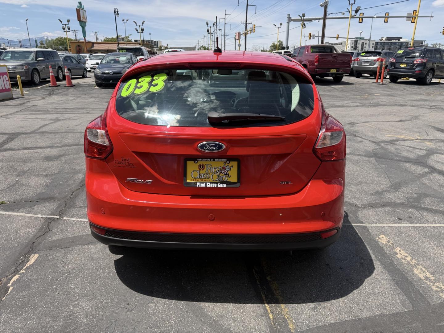 2012 Salsa Red Pearl /Tan Ford Focus SEL (1FAHP3M21CL) with an 2.0L L4 DOHC 16V engine, 6-Speed Automatic transmission, located at 801 South State Street, Salt Lake City, UT, 84111, (801) 328-0098, 40.751953, -111.888206 - Clean Title! Clean Carfax! Carfax shows only 2 previous owners and regular service was performed and maintained. Nice reliable and fuel efficient 2012 Ford Focus SEL with the dependable 2.0L 4 Cylinder engine! Great commuter car, first car, or affordable daily driver with a comfortable interior and - Photo#6