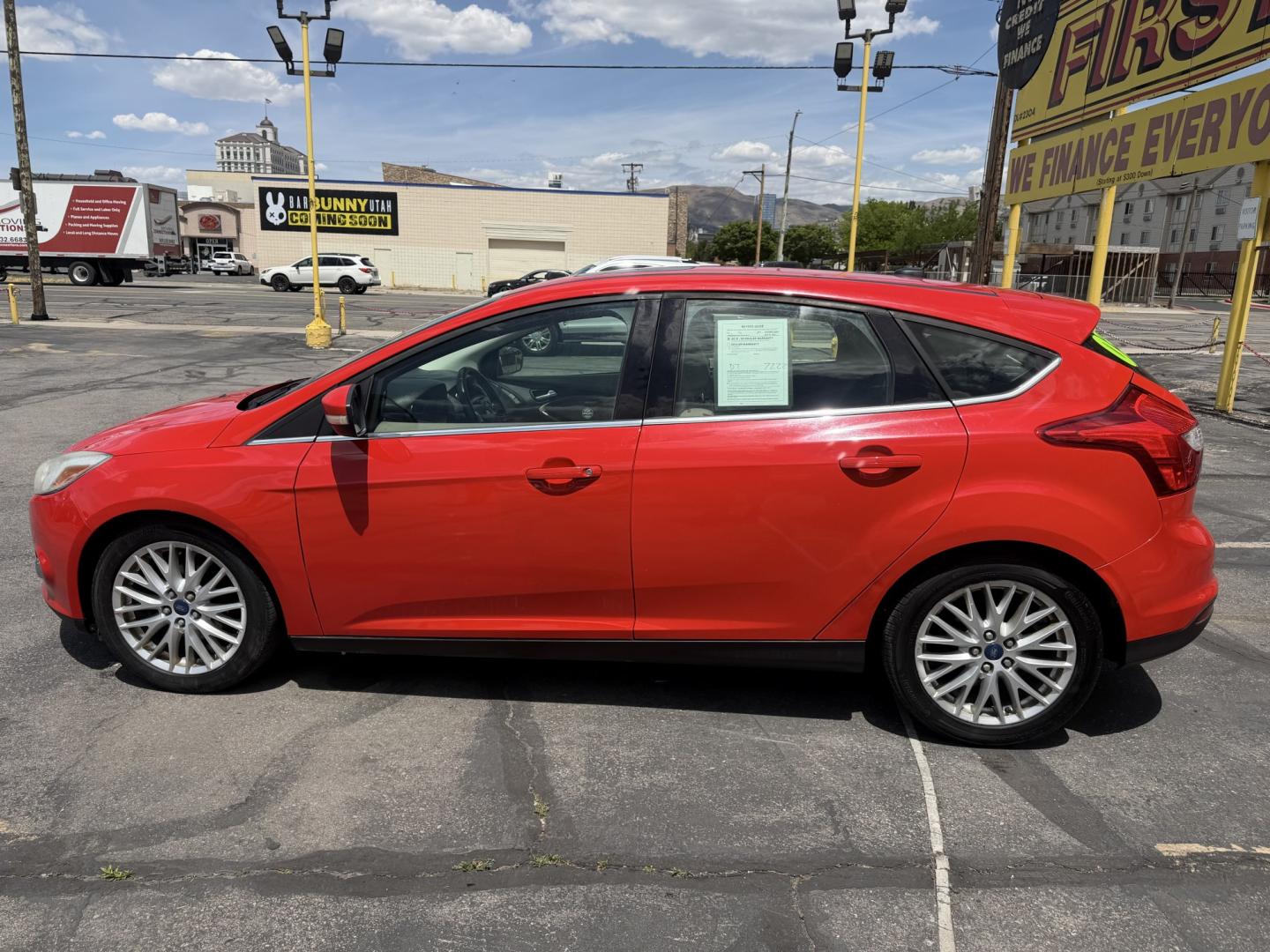 2012 Salsa Red Pearl /Tan Ford Focus SEL (1FAHP3M21CL) with an 2.0L L4 DOHC 16V engine, 6-Speed Automatic transmission, located at 801 South State Street, Salt Lake City, UT, 84111, (801) 328-0098, 40.751953, -111.888206 - Clean Title! Clean Carfax! Carfax shows only 2 previous owners and regular service was performed and maintained. Nice reliable and fuel efficient 2012 Ford Focus SEL with the dependable 2.0L 4 Cylinder engine! Great commuter car, first car, or affordable daily driver with a comfortable interior and - Photo#9