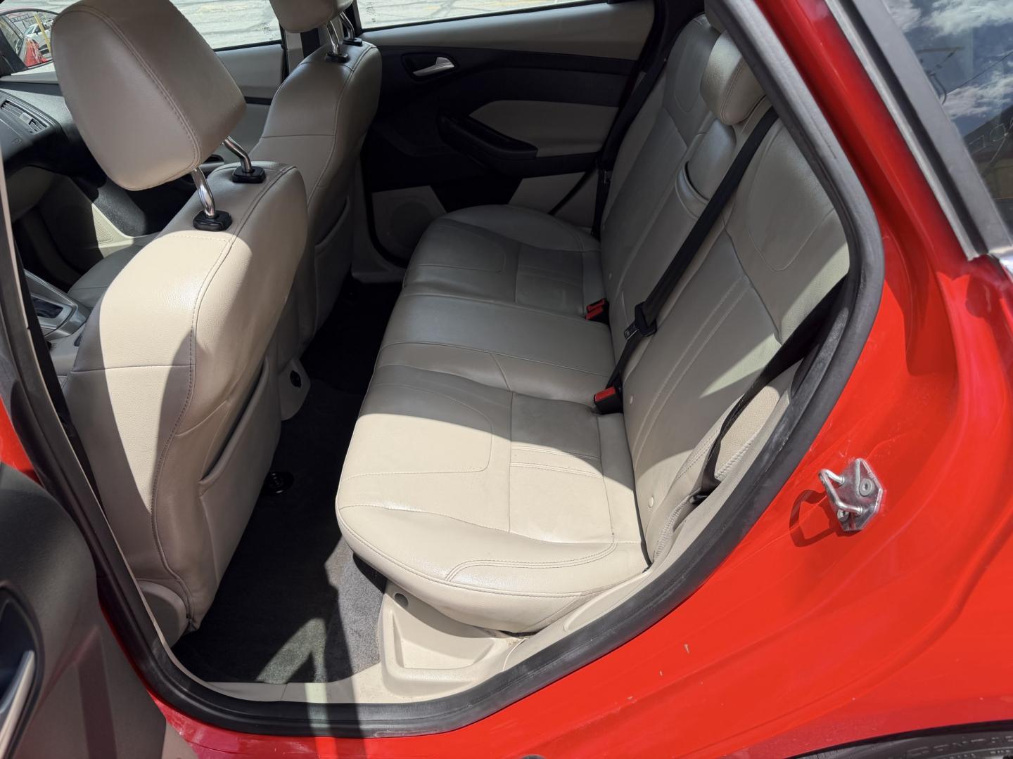 2012 Salsa Red Pearl /Tan Ford Focus SEL (1FAHP3M21CL) with an 2.0L L4 DOHC 16V engine, 6-Speed Automatic transmission, located at 801 South State Street, Salt Lake City, UT, 84111, (801) 328-0098, 40.751953, -111.888206 - Clean Title! Clean Carfax! Carfax shows only 2 previous owners and regular service was performed and maintained. Nice reliable and fuel efficient 2012 Ford Focus SEL with the dependable 2.0L 4 Cylinder engine! Great commuter car, first car, or affordable daily driver with a comfortable interior and - Photo#12