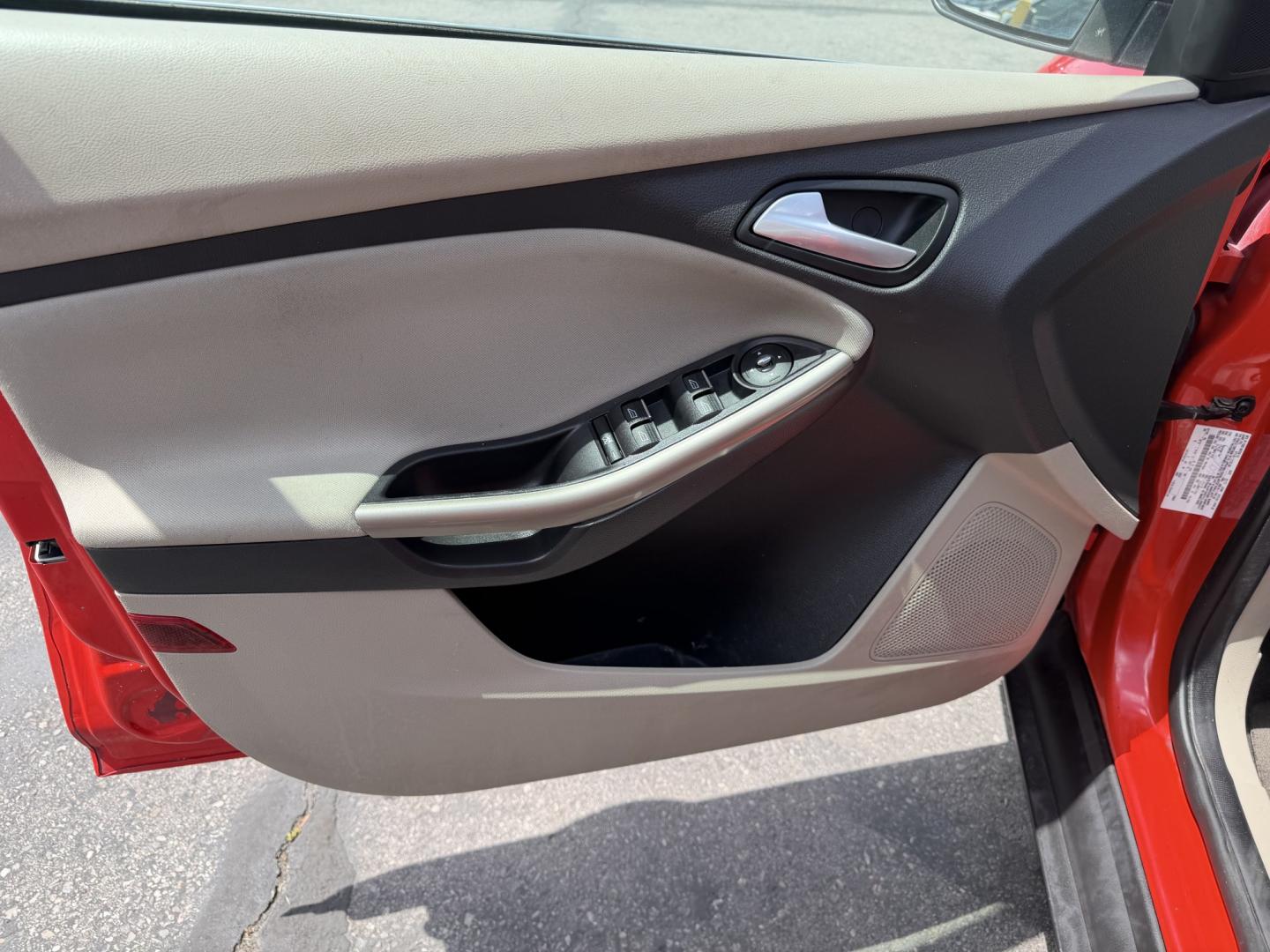 2012 Salsa Red Pearl /Tan Ford Focus SEL (1FAHP3M21CL) with an 2.0L L4 DOHC 16V engine, 6-Speed Automatic transmission, located at 801 South State Street, Salt Lake City, UT, 84111, (801) 328-0098, 40.751953, -111.888206 - Clean Title! Clean Carfax! Carfax shows only 2 previous owners and regular service was performed and maintained. Nice reliable and fuel efficient 2012 Ford Focus SEL with the dependable 2.0L 4 Cylinder engine! Great commuter car, first car, or affordable daily driver with a comfortable interior and - Photo#18