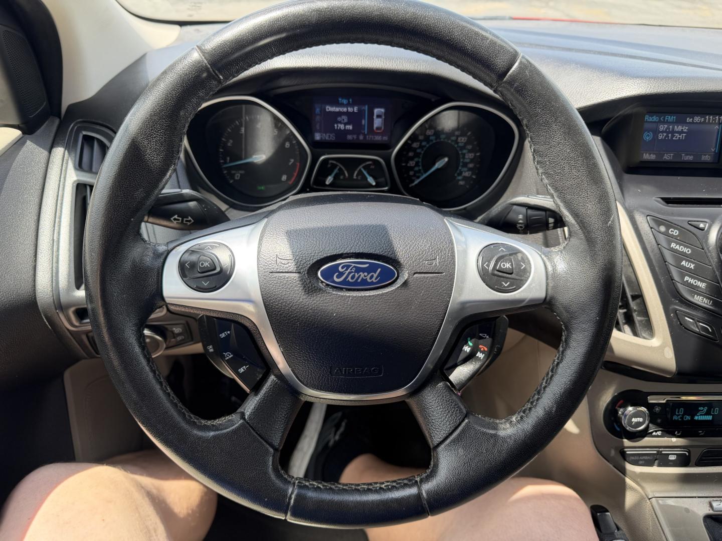 2012 Salsa Red Pearl /Tan Ford Focus SEL (1FAHP3M21CL) with an 2.0L L4 DOHC 16V engine, 6-Speed Automatic transmission, located at 801 South State Street, Salt Lake City, UT, 84111, (801) 328-0098, 40.751953, -111.888206 - Clean Title! Clean Carfax! Carfax shows only 2 previous owners and regular service was performed and maintained. Nice reliable and fuel efficient 2012 Ford Focus SEL with the dependable 2.0L 4 Cylinder engine! Great commuter car, first car, or affordable daily driver with a comfortable interior and - Photo#20