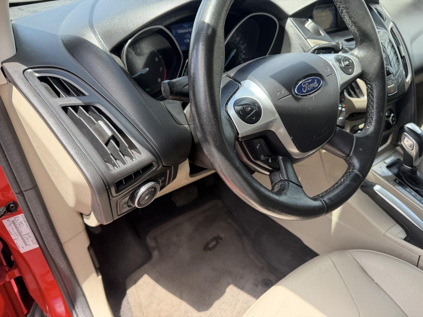 2012 Salsa Red Pearl /Tan Ford Focus SEL (1FAHP3M21CL) with an 2.0L L4 DOHC 16V engine, 6-Speed Automatic transmission, located at 801 South State Street, Salt Lake City, UT, 84111, (801) 328-0098, 40.751953, -111.888206 - Clean Title! Clean Carfax! Carfax shows only 2 previous owners and regular service was performed and maintained. Nice reliable and fuel efficient 2012 Ford Focus SEL with the dependable 2.0L 4 Cylinder engine! Great commuter car, first car, or affordable daily driver with a comfortable interior and - Photo#21