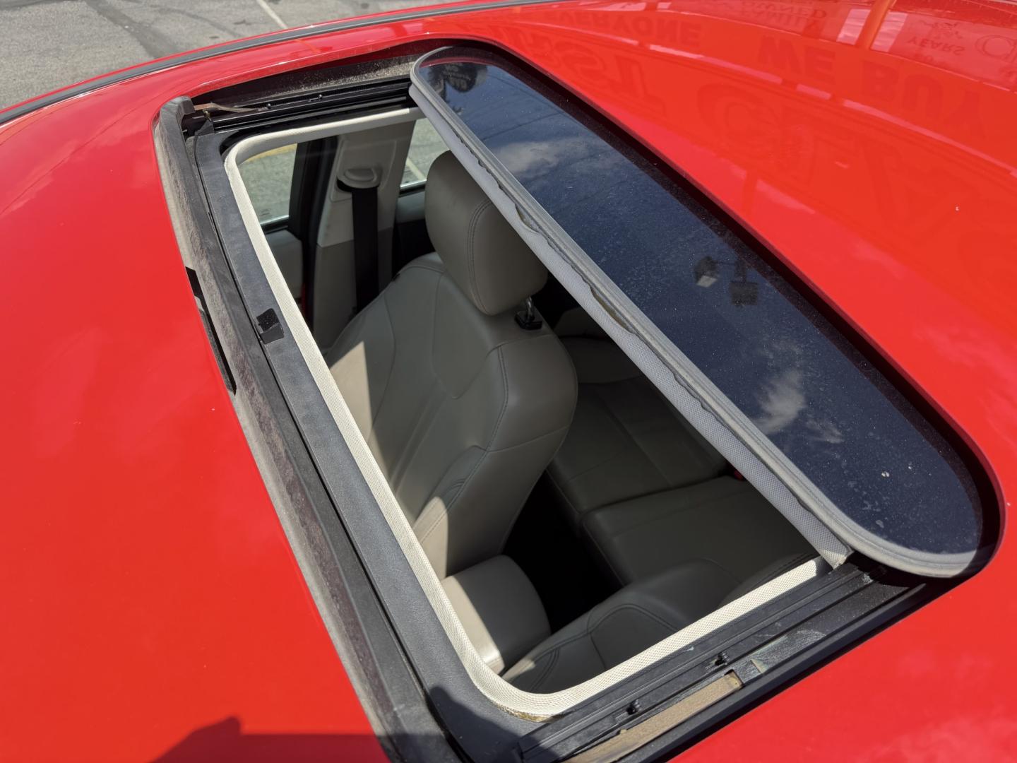 2012 Salsa Red Pearl /Tan Ford Focus SEL (1FAHP3M21CL) with an 2.0L L4 DOHC 16V engine, 6-Speed Automatic transmission, located at 801 South State Street, Salt Lake City, UT, 84111, (801) 328-0098, 40.751953, -111.888206 - Clean Title! Clean Carfax! Carfax shows only 2 previous owners and regular service was performed and maintained. Nice reliable and fuel efficient 2012 Ford Focus SEL with the dependable 2.0L 4 Cylinder engine! Great commuter car, first car, or affordable daily driver with a comfortable interior and - Photo#23