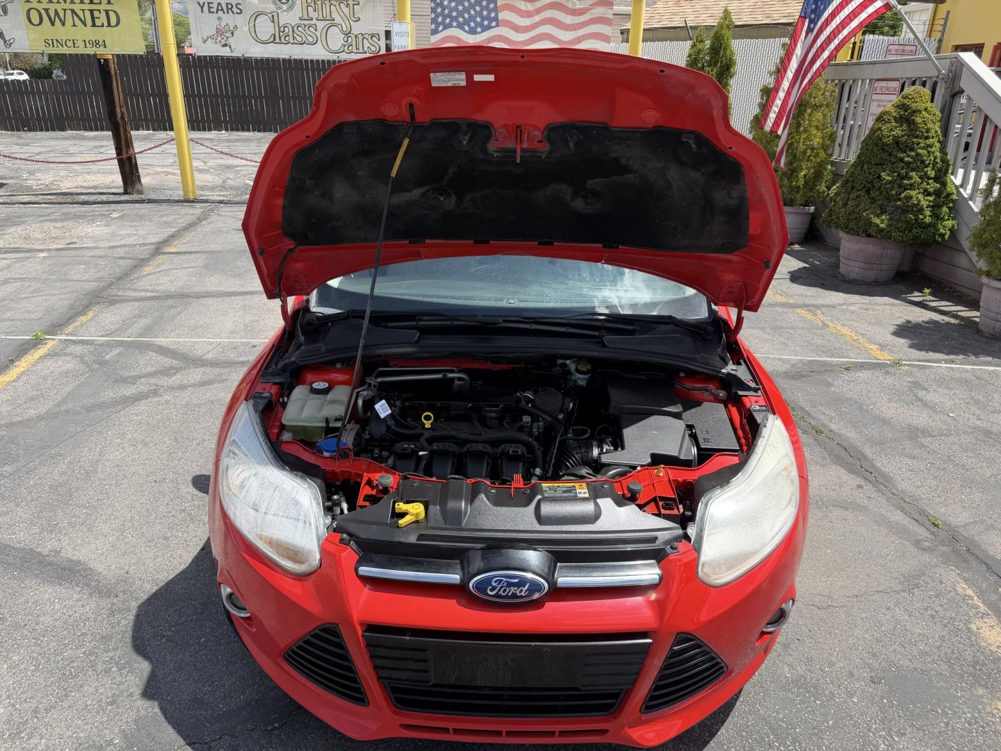 2012 Salsa Red Pearl /Tan Ford Focus SEL (1FAHP3M21CL) with an 2.0L L4 DOHC 16V engine, 6-Speed Automatic transmission, located at 801 South State Street, Salt Lake City, UT, 84111, (801) 328-0098, 40.751953, -111.888206 - Clean Title! Clean Carfax! Carfax shows only 2 previous owners and regular service was performed and maintained. Nice reliable and fuel efficient 2012 Ford Focus SEL with the dependable 2.0L 4 Cylinder engine! Great commuter car, first car, or affordable daily driver with a comfortable interior and - Photo#24