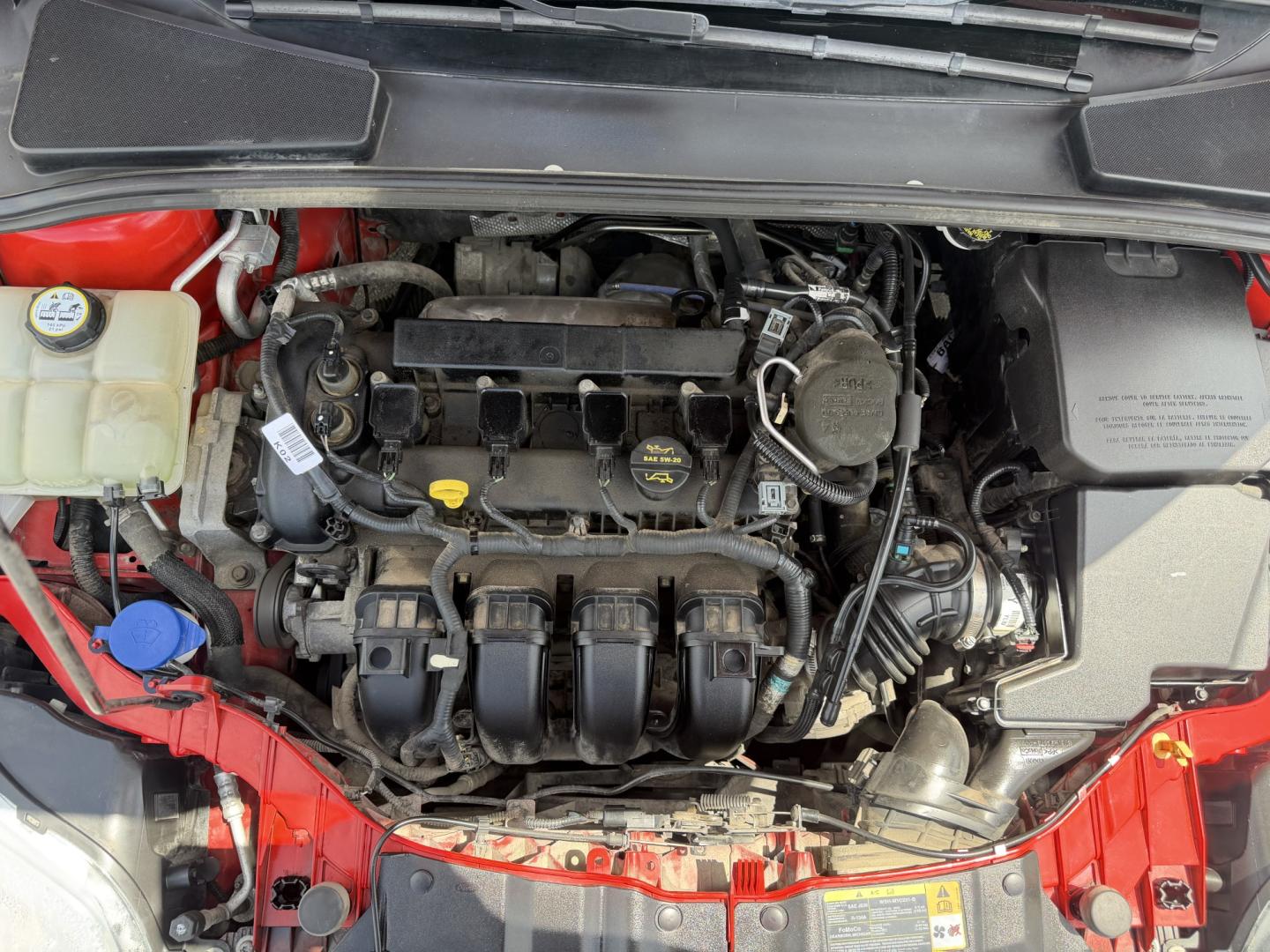 2012 Salsa Red Pearl /Tan Ford Focus SEL (1FAHP3M21CL) with an 2.0L L4 DOHC 16V engine, 6-Speed Automatic transmission, located at 801 South State Street, Salt Lake City, UT, 84111, (801) 328-0098, 40.751953, -111.888206 - Clean Title! Clean Carfax! Carfax shows only 2 previous owners and regular service was performed and maintained. Nice reliable and fuel efficient 2012 Ford Focus SEL with the dependable 2.0L 4 Cylinder engine! Great commuter car, first car, or affordable daily driver with a comfortable interior and - Photo#26