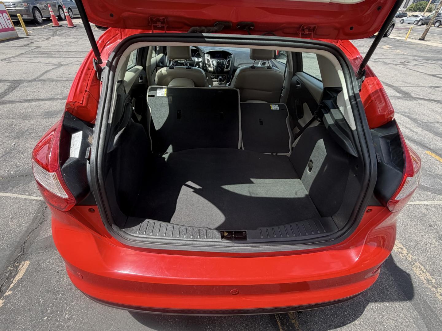 2012 Salsa Red Pearl /Tan Ford Focus SEL (1FAHP3M21CL) with an 2.0L L4 DOHC 16V engine, 6-Speed Automatic transmission, located at 801 South State Street, Salt Lake City, UT, 84111, (801) 328-0098, 40.751953, -111.888206 - Clean Title! Clean Carfax! Carfax shows only 2 previous owners and regular service was performed and maintained. Nice reliable and fuel efficient 2012 Ford Focus SEL with the dependable 2.0L 4 Cylinder engine! Great commuter car, first car, or affordable daily driver with a comfortable interior and - Photo#28