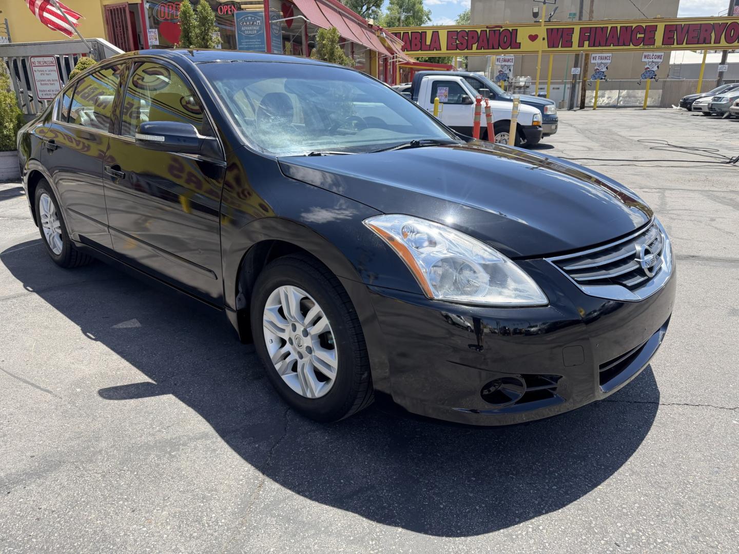 2012 Black /Black Nissan Altima 2.5 S (1N4AL2AP0CN) with an 2.5L L4 DOHC 16V engine, Automatic transmission, located at 801 South State Street, Salt Lake City, UT, 84111, (801) 328-0098, 40.751953, -111.888206 - Clean Title! Clean Carfax! Carfax shows only 2 previous owners and regular service was performed and maintained. Nice reliable and fuel efficient 2012 Nissan Altima 2.5 S Automatic with a comfortable ride and great features! Perfect commuter car, first car, or affordable daily driver with a smooth a - Photo#3