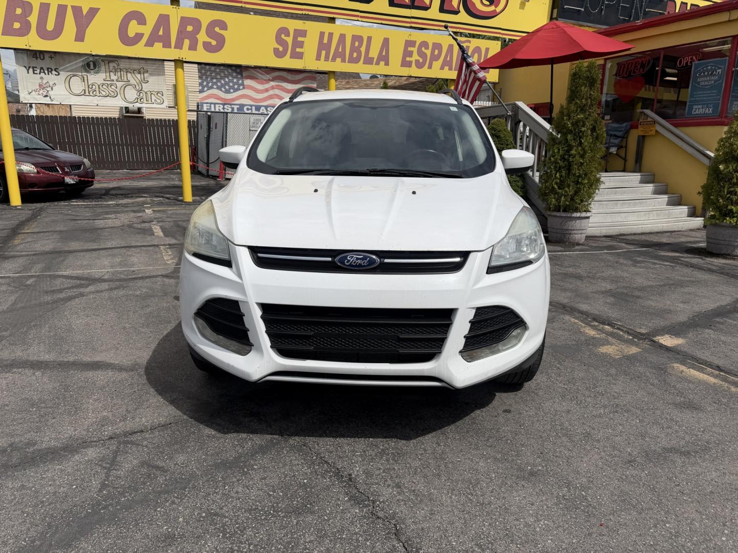 2015 Super White /Black Ford Escape SE 4WD (1FMCU9G93FU) with an 2.0L L4 DOHC 16V engine, 6-Speed Automatic transmission, located at 801 South State Street, Salt Lake City, UT, 84111, (801) 328-0098, 40.751953, -111.888206 - Clean Title! Clean Carfax! Carfax shows no accidents and only 3 previous owners. Nice dependable and fuel efficient 2015 Ford Escape SE 4x4 with the powerful turbo charged engine! Great SUV for commuting, road trips, family driving, or winter weather with plenty of cargo space and comfortable seatin - Photo#2