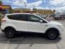 2015 Super White /Black Ford Escape SE 4WD (1FMCU9G93FU) with an 2.0L L4 DOHC 16V engine, 6-Speed Automatic transmission, located at 801 South State Street, Salt Lake City, UT, 84111, (801) 328-0098, 40.751953, -111.888206 - Clean Title! Clean Carfax! Carfax shows no accidents and only 3 previous owners. Nice dependable and fuel efficient 2015 Ford Escape SE 4x4 with the powerful turbo charged engine! Great SUV for commuting, road trips, family driving, or winter weather with plenty of cargo space and comfortable seatin - Photo#4