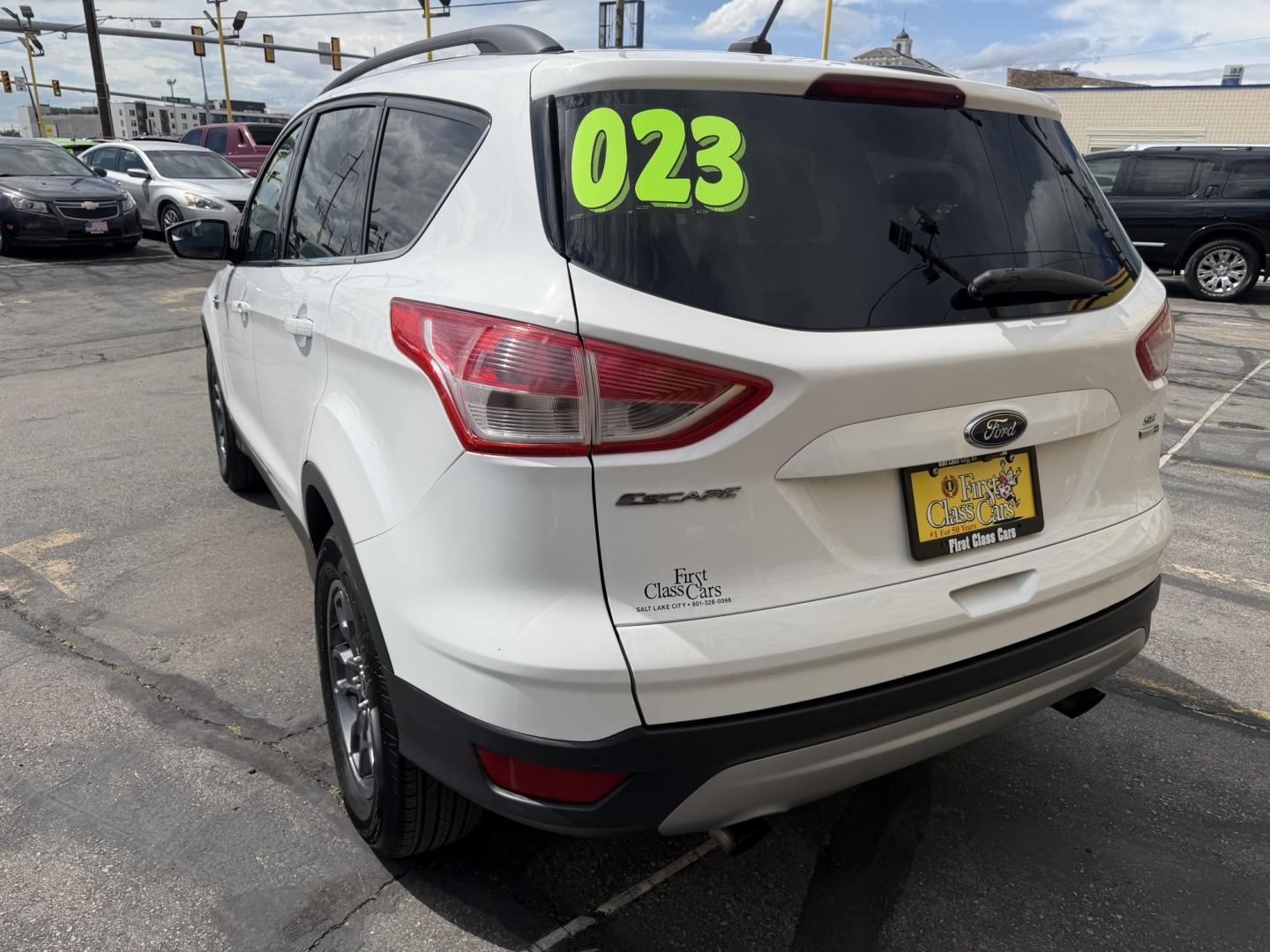 2015 Super White /Black Ford Escape SE 4WD (1FMCU9G93FU) with an 2.0L L4 DOHC 16V engine, 6-Speed Automatic transmission, located at 801 South State Street, Salt Lake City, UT, 84111, (801) 328-0098, 40.751953, -111.888206 - Clean Title! Clean Carfax! Carfax shows no accidents and only 3 previous owners. Nice dependable and fuel efficient 2015 Ford Escape SE 4x4 with the powerful turbo charged engine! Great SUV for commuting, road trips, family driving, or winter weather with plenty of cargo space and comfortable seatin - Photo#8