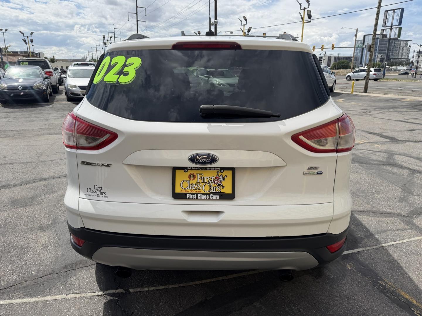 2015 Super White /Black Ford Escape SE 4WD (1FMCU9G93FU) with an 2.0L L4 DOHC 16V engine, 6-Speed Automatic transmission, located at 801 South State Street, Salt Lake City, UT, 84111, (801) 328-0098, 40.751953, -111.888206 - Clean Title! Clean Carfax! Carfax shows no accidents and only 3 previous owners. Nice dependable and fuel efficient 2015 Ford Escape SE 4x4 with the powerful turbo charged engine! Great SUV for commuting, road trips, family driving, or winter weather with plenty of cargo space and comfortable seatin - Photo#7