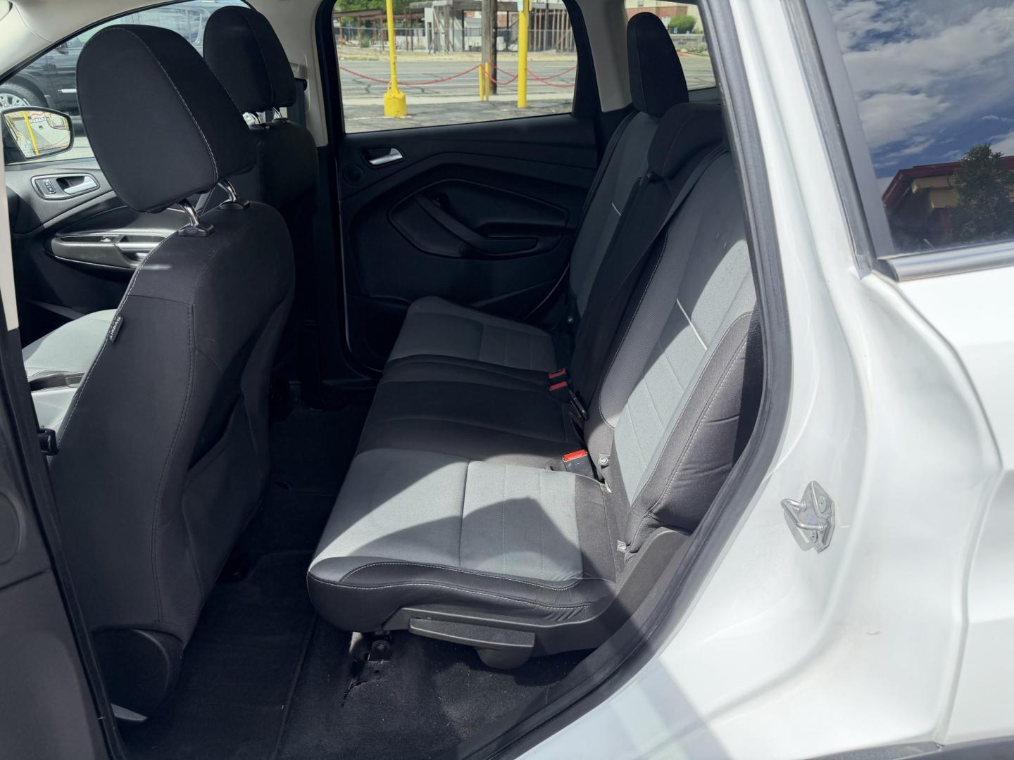 2015 Super White /Black Ford Escape SE 4WD (1FMCU9G93FU) with an 2.0L L4 DOHC 16V engine, 6-Speed Automatic transmission, located at 801 South State Street, Salt Lake City, UT, 84111, (801) 328-0098, 40.751953, -111.888206 - Clean Title! Clean Carfax! Carfax shows no accidents and only 3 previous owners. Nice dependable and fuel efficient 2015 Ford Escape SE 4x4 with the powerful turbo charged engine! Great SUV for commuting, road trips, family driving, or winter weather with plenty of cargo space and comfortable seatin - Photo#16