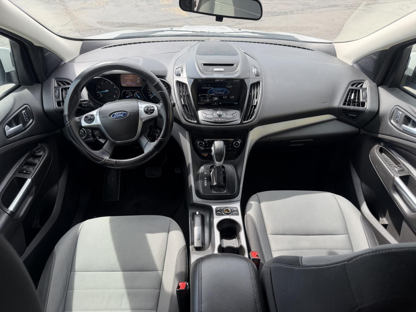 2015 Super White /Black Ford Escape SE 4WD (1FMCU9G93FU) with an 2.0L L4 DOHC 16V engine, 6-Speed Automatic transmission, located at 801 South State Street, Salt Lake City, UT, 84111, (801) 328-0098, 40.751953, -111.888206 - Clean Title! Clean Carfax! Carfax shows no accidents and only 3 previous owners. Nice dependable and fuel efficient 2015 Ford Escape SE 4x4 with the powerful turbo charged engine! Great SUV for commuting, road trips, family driving, or winter weather with plenty of cargo space and comfortable seatin - Photo#13