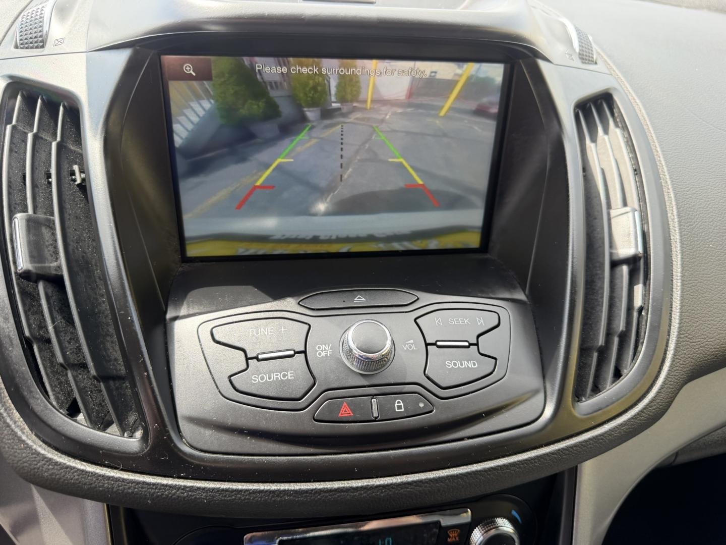 2015 Super White /Black Ford Escape SE 4WD (1FMCU9G93FU) with an 2.0L L4 DOHC 16V engine, 6-Speed Automatic transmission, located at 801 South State Street, Salt Lake City, UT, 84111, (801) 328-0098, 40.751953, -111.888206 - Clean Title! Clean Carfax! Carfax shows no accidents and only 3 previous owners. Nice dependable and fuel efficient 2015 Ford Escape SE 4x4 with the powerful turbo charged engine! Great SUV for commuting, road trips, family driving, or winter weather with plenty of cargo space and comfortable seatin - Photo#18