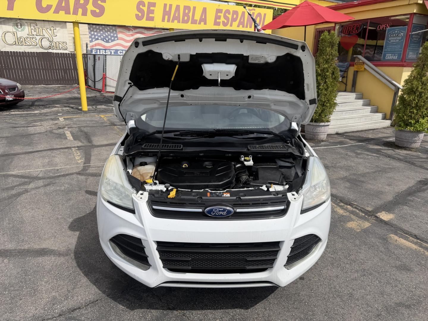 2015 Super White /Black Ford Escape SE 4WD (1FMCU9G93FU) with an 2.0L L4 DOHC 16V engine, 6-Speed Automatic transmission, located at 801 South State Street, Salt Lake City, UT, 84111, (801) 328-0098, 40.751953, -111.888206 - Clean Title! Clean Carfax! Carfax shows no accidents and only 3 previous owners. Nice dependable and fuel efficient 2015 Ford Escape SE 4x4 with the powerful turbo charged engine! Great SUV for commuting, road trips, family driving, or winter weather with plenty of cargo space and comfortable seatin - Photo#30
