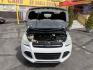 2015 Super White /Black Ford Escape SE 4WD (1FMCU9G93FU) with an 2.0L L4 DOHC 16V engine, 6-Speed Automatic transmission, located at 801 South State Street, Salt Lake City, UT, 84111, (801) 328-0098, 40.751953, -111.888206 - Clean Title! Clean Carfax! Carfax shows no accidents and only 3 previous owners. Nice dependable and fuel efficient 2015 Ford Escape SE 4x4 with the powerful turbo charged engine! Great SUV for commuting, road trips, family driving, or winter weather with plenty of cargo space and comfortable seatin - Photo#30