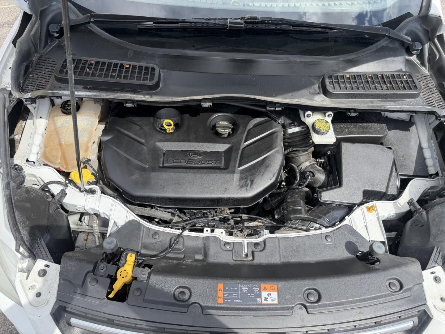 2015 Super White /Black Ford Escape SE 4WD (1FMCU9G93FU) with an 2.0L L4 DOHC 16V engine, 6-Speed Automatic transmission, located at 801 South State Street, Salt Lake City, UT, 84111, (801) 328-0098, 40.751953, -111.888206 - Clean Title! Clean Carfax! Carfax shows no accidents and only 3 previous owners. Nice dependable and fuel efficient 2015 Ford Escape SE 4x4 with the powerful turbo charged engine! Great SUV for commuting, road trips, family driving, or winter weather with plenty of cargo space and comfortable seatin - Photo#27