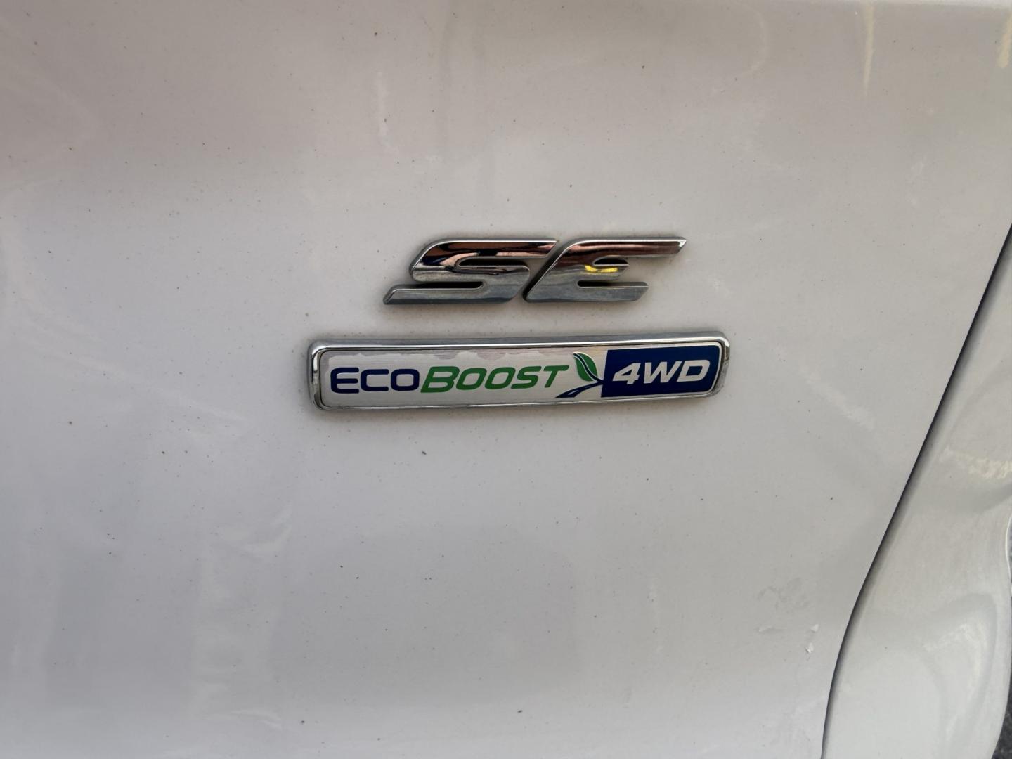 2015 Super White /Black Ford Escape SE 4WD (1FMCU9G93FU) with an 2.0L L4 DOHC 16V engine, 6-Speed Automatic transmission, located at 801 South State Street, Salt Lake City, UT, 84111, (801) 328-0098, 40.751953, -111.888206 - Clean Title! Clean Carfax! Carfax shows no accidents and only 3 previous owners. Nice dependable and fuel efficient 2015 Ford Escape SE 4x4 with the powerful turbo charged engine! Great SUV for commuting, road trips, family driving, or winter weather with plenty of cargo space and comfortable seatin - Photo#32