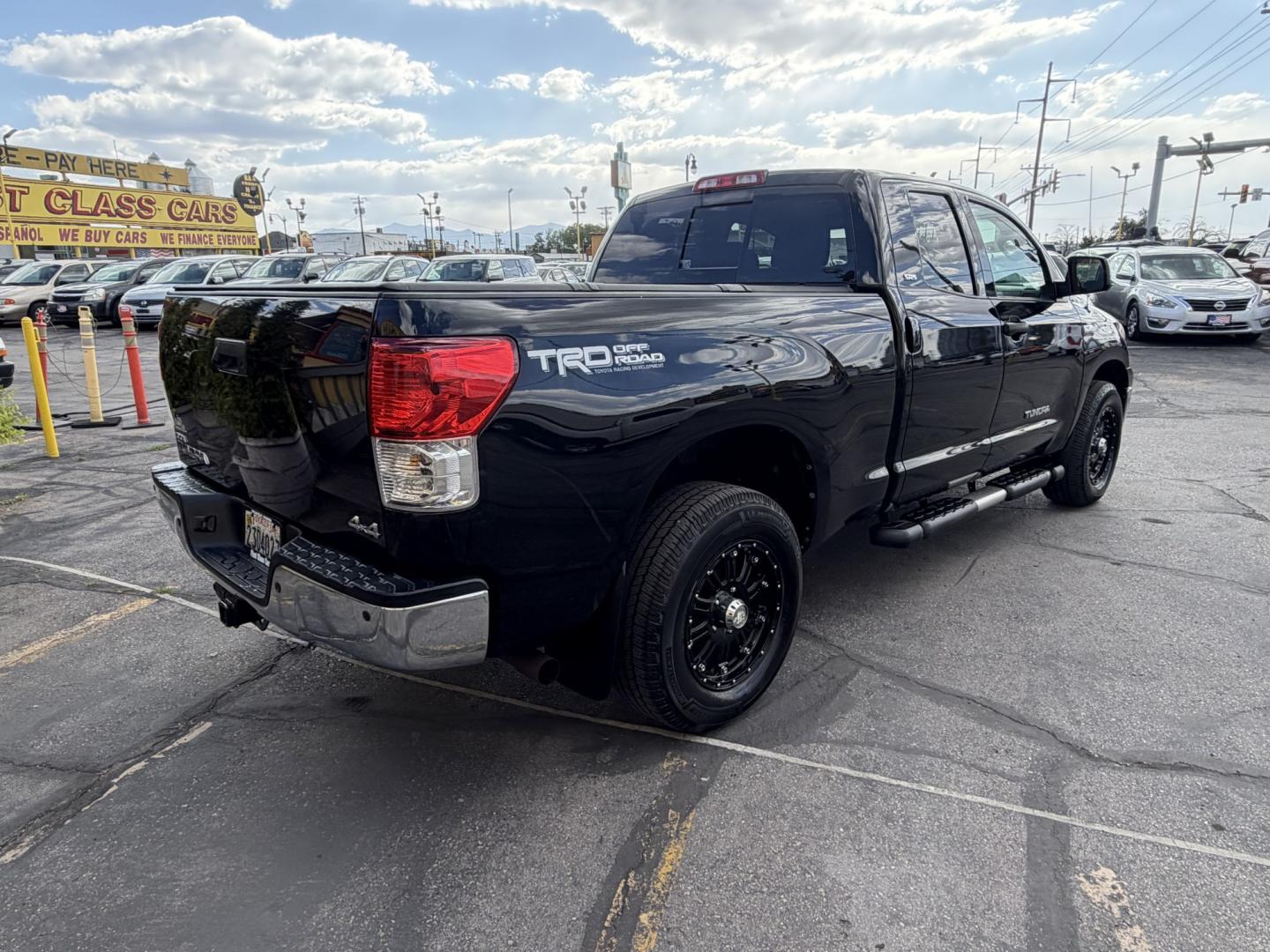 2013 Black /Black Toyota Tundra Tundra-Grade 5.7L Double Cab 4WD (5TFUY5F19DX) with an 5.7L V8 DOHC 32V engine, 6-Speed Automatic Overdrive transmission, located at 801 South State Street, Salt Lake City, UT, 84111, (801) 328-0098, 40.751953, -111.888206 - Clean Title! Only 2 Previous Owners and No Accidents Reported on the CarFax! This beautiful 2013 Toyota Tundra 4x4 is immaculate inside and out and has clearly been exceptionally well maintained. CarFax shows an impressive 35 documented service records, including regular maintenance and oil changes, - Photo#8