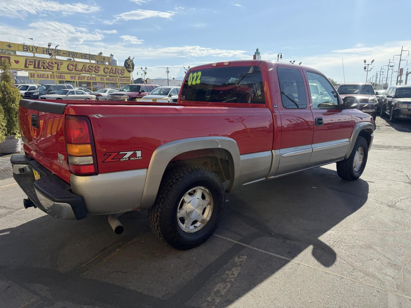 2003 Flame Red /Gray GMC Sierra 1500 Ext. Cab Long Bed 4WD (2GTEK19T031) with an 5.3L V8 OHV 16V engine, 4A OD transmission, located at 801 South State Street, Salt Lake City, UT, 84111, (801) 328-0098, 40.751953, -111.888206 - Clean title! Clean Carfax history report!!! Carfax shows no accidents vehicle has been meticulously maintained and had regular service according to Carfax!!! Approved for up to a 5 year warranty that can be added on to the vehicle you can get anywhere from a 3 month up to a 5 year warranty!!! Featu- Photo#5