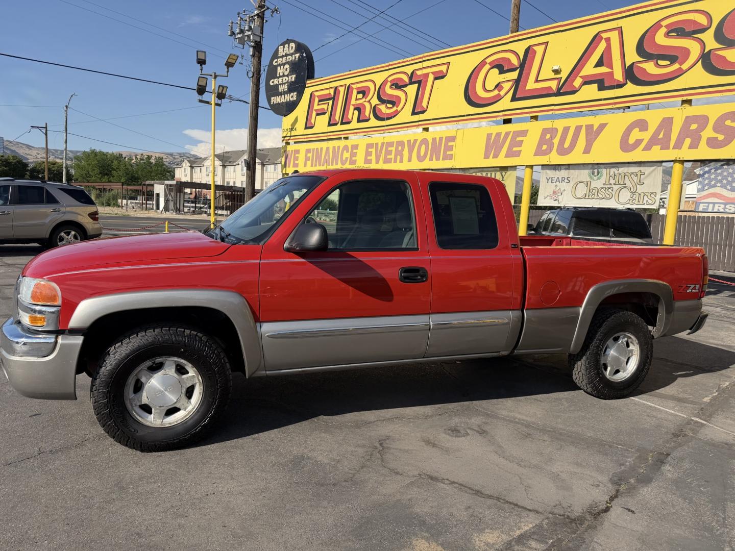 2003 Flame Red /Gray GMC Sierra 1500 Ext. Cab Long Bed 4WD (2GTEK19T031) with an 5.3L V8 OHV 16V engine, 4A OD transmission, located at 801 South State Street, Salt Lake City, UT, 84111, (801) 328-0098, 40.751953, -111.888206 - Clean title! Clean Carfax history report!!! Carfax shows no accidents vehicle has been meticulously maintained and had regular service according to Carfax!!! Approved for up to a 5 year warranty that can be added on to the vehicle you can get anywhere from a 3 month up to a 5 year warranty!!! Featu- Photo#9