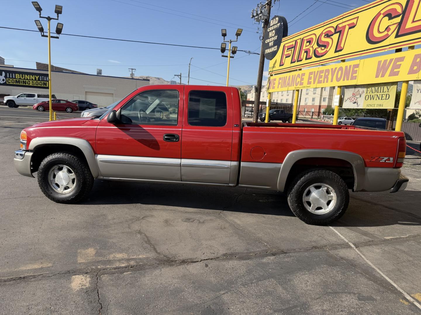 2003 Flame Red /Gray GMC Sierra 1500 Ext. Cab Long Bed 4WD (2GTEK19T031) with an 5.3L V8 OHV 16V engine, 4A OD transmission, located at 801 South State Street, Salt Lake City, UT, 84111, (801) 328-0098, 40.751953, -111.888206 - Clean title! Clean Carfax history report!!! Carfax shows no accidents vehicle has been meticulously maintained and had regular service according to Carfax!!! Approved for up to a 5 year warranty that can be added on to the vehicle you can get anywhere from a 3 month up to a 5 year warranty!!! Featu- Photo#8