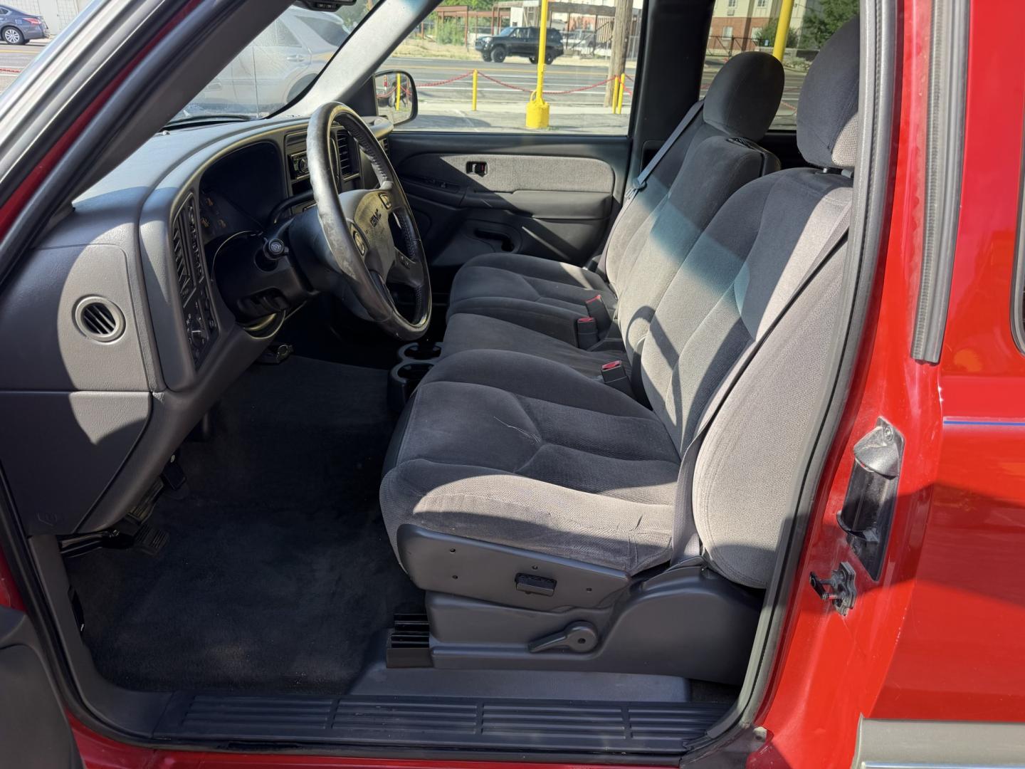 2003 Flame Red /Gray GMC Sierra 1500 Ext. Cab Long Bed 4WD (2GTEK19T031) with an 5.3L V8 OHV 16V engine, 4A OD transmission, located at 801 South State Street, Salt Lake City, UT, 84111, (801) 328-0098, 40.751953, -111.888206 - Clean title! Clean Carfax history report!!! Carfax shows no accidents vehicle has been meticulously maintained and had regular service according to Carfax!!! Approved for up to a 5 year warranty that can be added on to the vehicle you can get anywhere from a 3 month up to a 5 year warranty!!! Featu- Photo#13