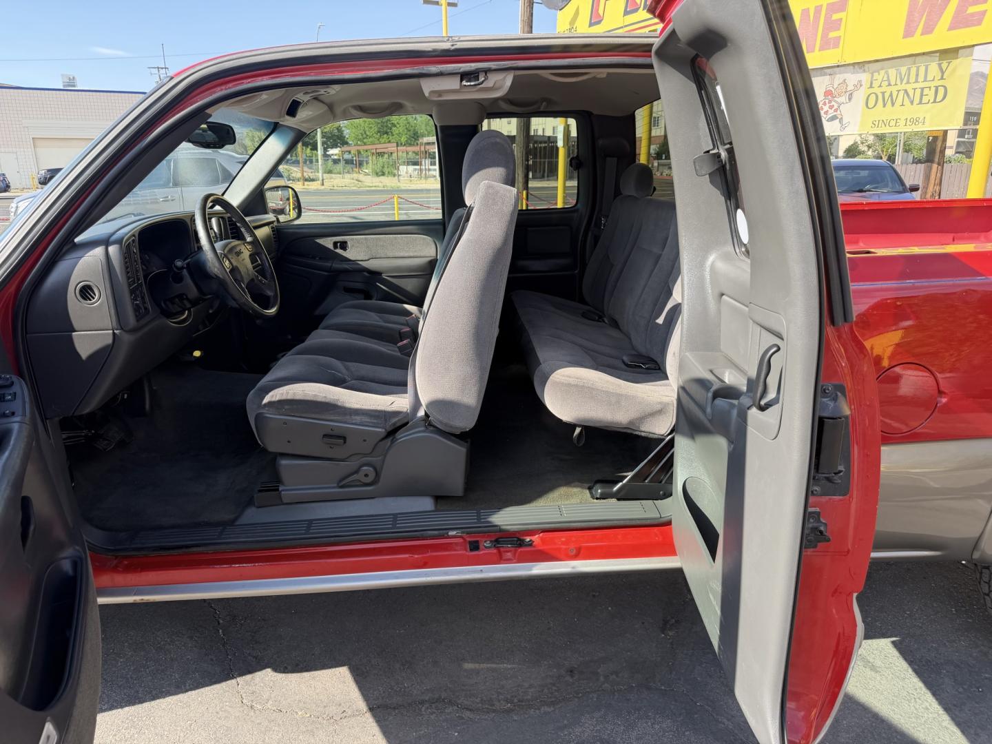 2003 Flame Red /Gray GMC Sierra 1500 Ext. Cab Long Bed 4WD (2GTEK19T031) with an 5.3L V8 OHV 16V engine, 4A OD transmission, located at 801 South State Street, Salt Lake City, UT, 84111, (801) 328-0098, 40.751953, -111.888206 - Clean title! Clean Carfax history report!!! Carfax shows no accidents vehicle has been meticulously maintained and had regular service according to Carfax!!! Approved for up to a 5 year warranty that can be added on to the vehicle you can get anywhere from a 3 month up to a 5 year warranty!!! Featu- Photo#14