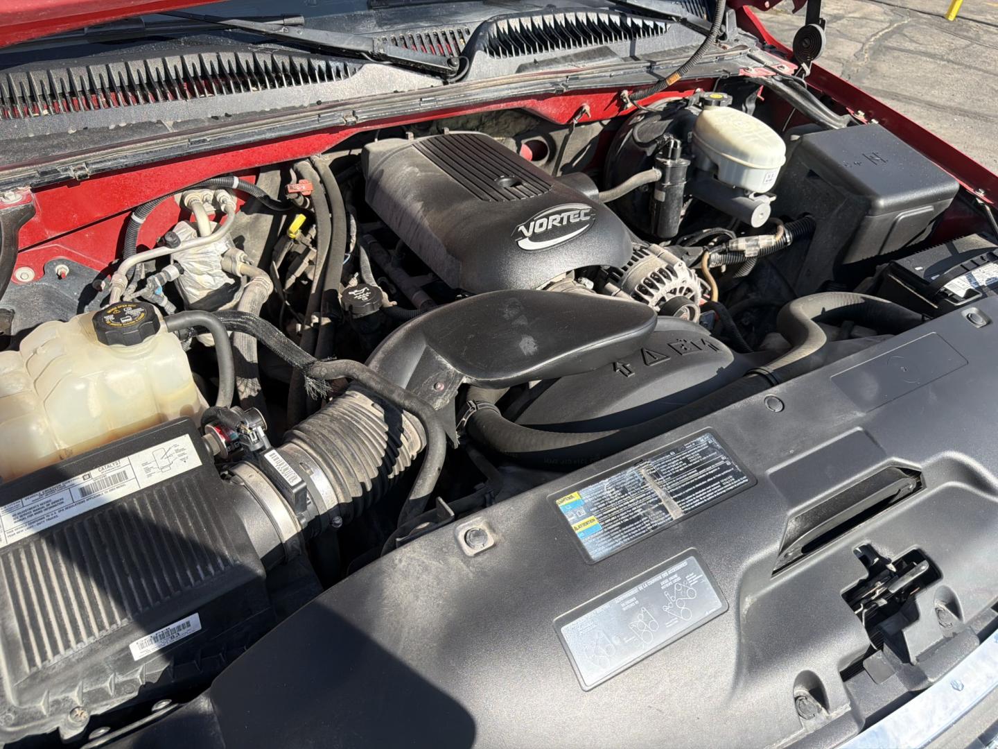 2003 Flame Red /Gray GMC Sierra 1500 Ext. Cab Long Bed 4WD (2GTEK19T031) with an 5.3L V8 OHV 16V engine, 4A OD transmission, located at 801 South State Street, Salt Lake City, UT, 84111, (801) 328-0098, 40.751953, -111.888206 - Clean title! Clean Carfax history report!!! Carfax shows no accidents vehicle has been meticulously maintained and had regular service according to Carfax!!! Approved for up to a 5 year warranty that can be added on to the vehicle you can get anywhere from a 3 month up to a 5 year warranty!!! Featu- Photo#25