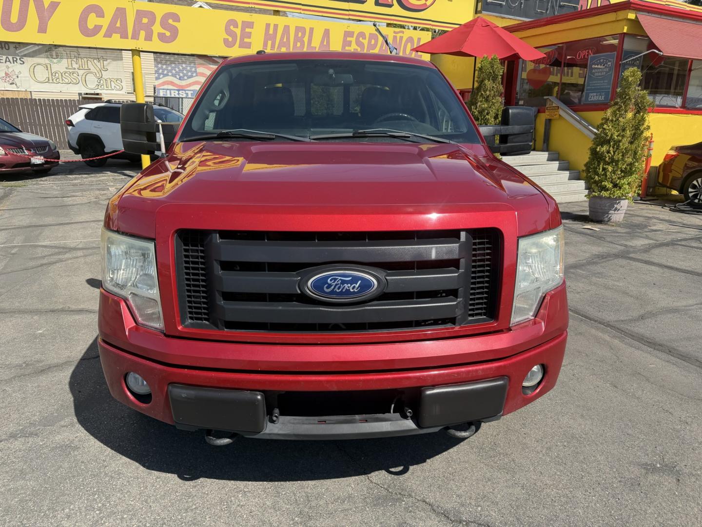 2010 Flame Red /Black Ford F-150 Lariat SuperCrew 5.5-ft. Bed 4WD (1FTFW1EV4AF) with an 5.4L V8 SOHC 24V FFV engine, 4A transmission, located at 801 South State Street, Salt Lake City, UT, 84111, (801) 328-0098, 40.751953, -111.888206 - FX4 package and 4x4. Great condition! Clean title! Low miles for the year! This truck has been regularly serviced and maintained and cared for runs and drives great!!!! Approved for up to a 5 year bumper to bumper warranty that can be added onto the vehicle. Features: 4WD/AWD, ABS Brakes, Air Cond- Photo#2