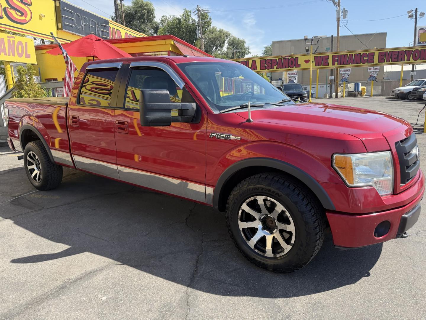 2010 Flame Red /Black Ford F-150 Lariat SuperCrew 5.5-ft. Bed 4WD (1FTFW1EV4AF) with an 5.4L V8 SOHC 24V FFV engine, 4A transmission, located at 801 South State Street, Salt Lake City, UT, 84111, (801) 328-0098, 40.751953, -111.888206 - FX4 package and 4x4. Great condition! Clean title! Low miles for the year! This truck has been regularly serviced and maintained and cared for runs and drives great!!!! Approved for up to a 5 year bumper to bumper warranty that can be added onto the vehicle. Features: 4WD/AWD, ABS Brakes, Air Cond- Photo#4