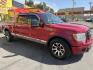 2010 Flame Red /Black Ford F-150 Lariat SuperCrew 5.5-ft. Bed 4WD (1FTFW1EV4AF) with an 5.4L V8 SOHC 24V FFV engine, 4A transmission, located at 801 South State Street, Salt Lake City, UT, 84111, (801) 328-0098, 40.751953, -111.888206 - FX4 package and 4x4. Great condition! Clean title! Low miles for the year! This truck has been regularly serviced and maintained and cared for runs and drives great!!!! Approved for up to a 5 year bumper to bumper warranty that can be added onto the vehicle. Features: 4WD/AWD, ABS Brakes, Air Cond- Photo#4