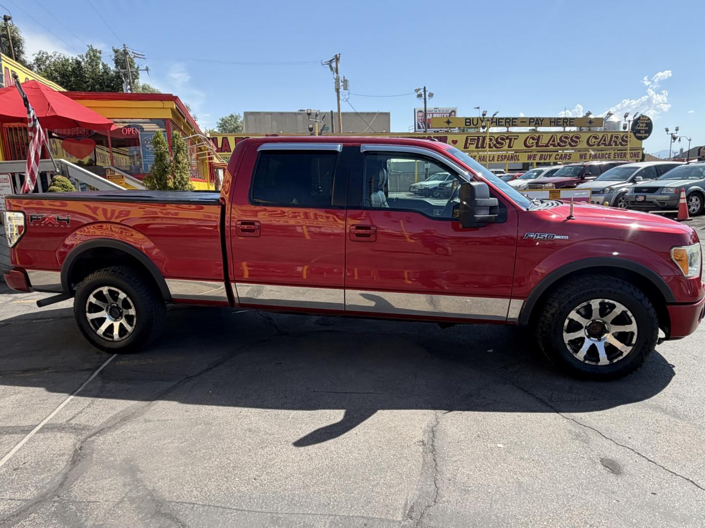 2010 Flame Red /Black Ford F-150 Lariat SuperCrew 5.5-ft. Bed 4WD (1FTFW1EV4AF) with an 5.4L V8 SOHC 24V FFV engine, 4A transmission, located at 801 South State Street, Salt Lake City, UT, 84111, (801) 328-0098, 40.751953, -111.888206 - FX4 package and 4x4. Great condition! Clean title! Low miles for the year! This truck has been regularly serviced and maintained and cared for runs and drives great!!!! Approved for up to a 5 year bumper to bumper warranty that can be added onto the vehicle. Features: 4WD/AWD, ABS Brakes, Air Cond- Photo#5