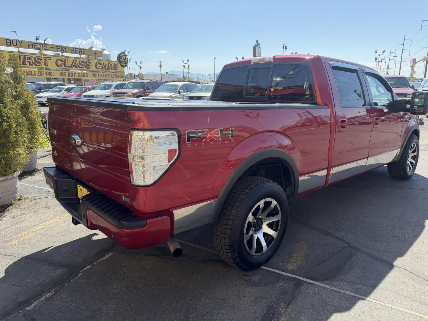 2010 Flame Red /Black Ford F-150 Lariat SuperCrew 5.5-ft. Bed 4WD (1FTFW1EV4AF) with an 5.4L V8 SOHC 24V FFV engine, 4A transmission, located at 801 South State Street, Salt Lake City, UT, 84111, (801) 328-0098, 40.751953, -111.888206 - FX4 package and 4x4. Great condition! Clean title! Low miles for the year! This truck has been regularly serviced and maintained and cared for runs and drives great!!!! Approved for up to a 5 year bumper to bumper warranty that can be added onto the vehicle. Features: 4WD/AWD, ABS Brakes, Air Cond- Photo#6