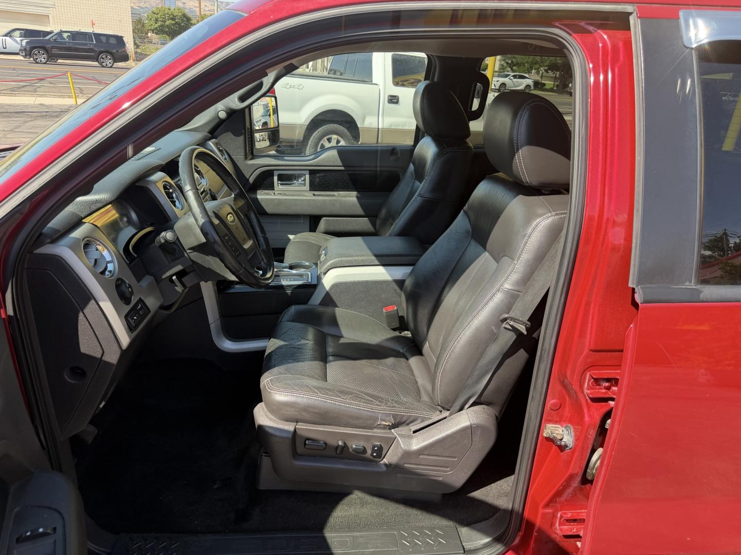 2010 Flame Red /Black Ford F-150 Lariat SuperCrew 5.5-ft. Bed 4WD (1FTFW1EV4AF) with an 5.4L V8 SOHC 24V FFV engine, 4A transmission, located at 801 South State Street, Salt Lake City, UT, 84111, (801) 328-0098, 40.751953, -111.888206 - FX4 package and 4x4. Great condition! Clean title! Low miles for the year! This truck has been regularly serviced and maintained and cared for runs and drives great!!!! Approved for up to a 5 year bumper to bumper warranty that can be added onto the vehicle. Features: 4WD/AWD, ABS Brakes, Air Cond- Photo#13