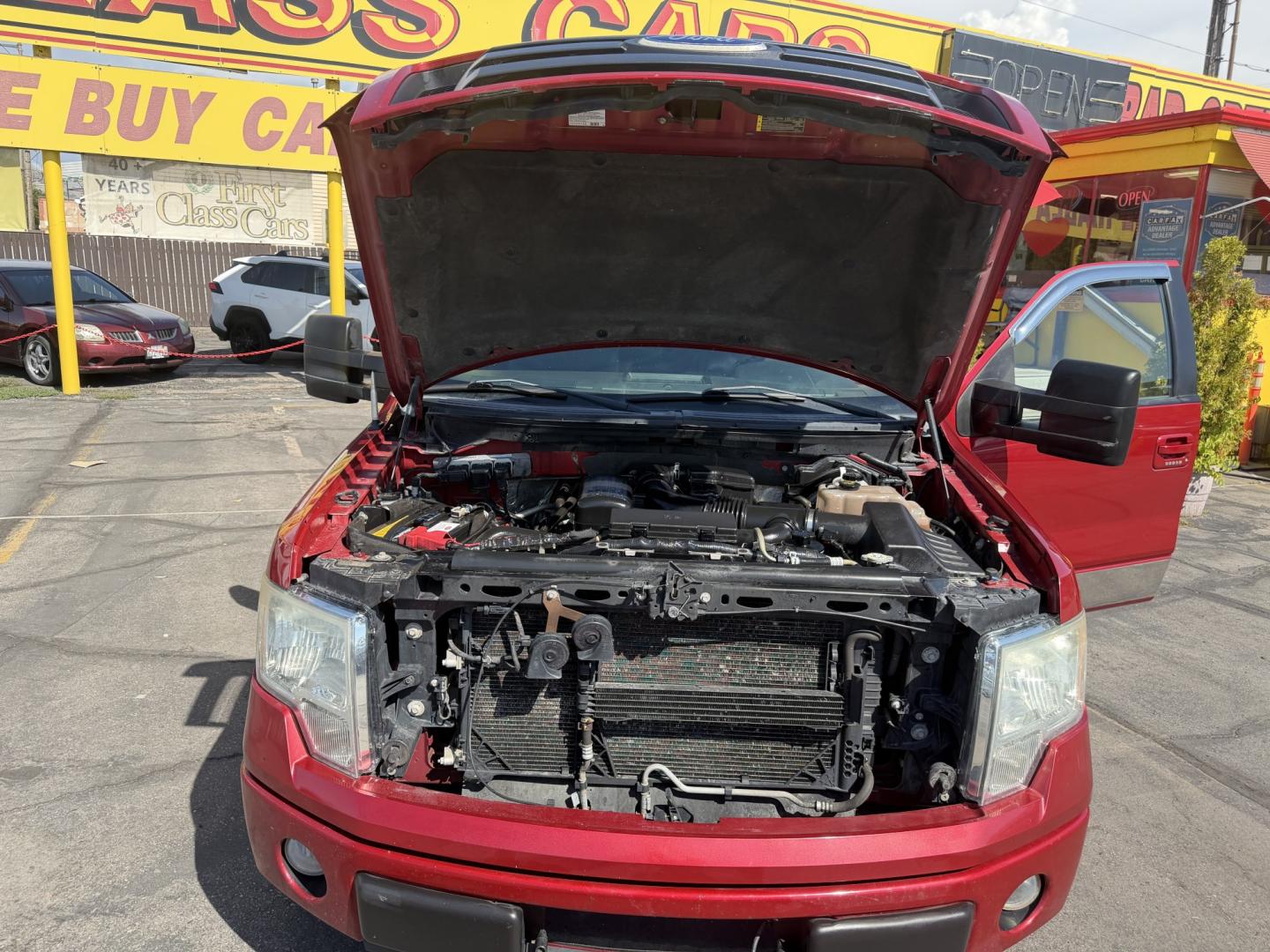 2010 Flame Red /Black Ford F-150 Lariat SuperCrew 5.5-ft. Bed 4WD (1FTFW1EV4AF) with an 5.4L V8 SOHC 24V FFV engine, 4A transmission, located at 801 South State Street, Salt Lake City, UT, 84111, (801) 328-0098, 40.751953, -111.888206 - FX4 package and 4x4. Great condition! Clean title! Low miles for the year! This truck has been regularly serviced and maintained and cared for runs and drives great!!!! Approved for up to a 5 year bumper to bumper warranty that can be added onto the vehicle. Features: 4WD/AWD, ABS Brakes, Air Cond- Photo#24