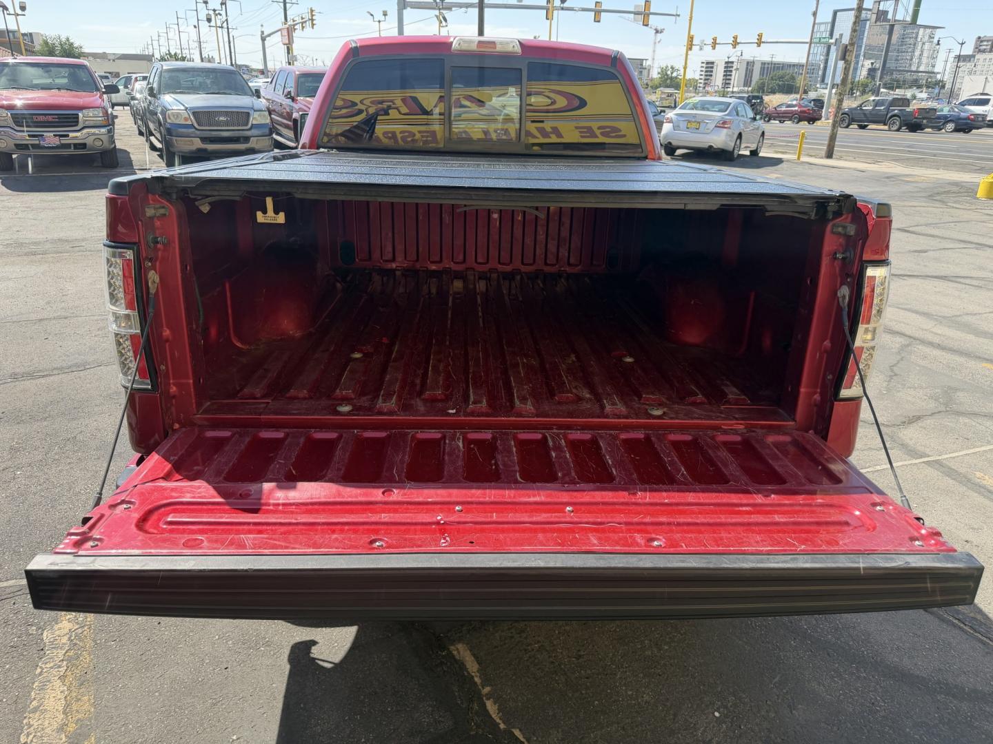 2010 Flame Red /Black Ford F-150 Lariat SuperCrew 5.5-ft. Bed 4WD (1FTFW1EV4AF) with an 5.4L V8 SOHC 24V FFV engine, 4A transmission, located at 801 South State Street, Salt Lake City, UT, 84111, (801) 328-0098, 40.751953, -111.888206 - FX4 package and 4x4. Great condition! Clean title! Low miles for the year! This truck has been regularly serviced and maintained and cared for runs and drives great!!!! Approved for up to a 5 year bumper to bumper warranty that can be added onto the vehicle. Features: 4WD/AWD, ABS Brakes, Air Cond- Photo#27