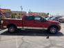 2010 Flame Red /Black Ford F-150 Lariat SuperCrew 5.5-ft. Bed 4WD (1FTFW1EV4AF) with an 5.4L V8 SOHC 24V FFV engine, 4A transmission, located at 801 South State Street, Salt Lake City, UT, 84111, (801) 328-0098, 40.751953, -111.888206 - FX4 package and 4x4. Great condition! Clean title! Low miles for the year! This truck has been regularly serviced and maintained and cared for runs and drives great!!!! Approved for up to a 5 year bumper to bumper warranty that can be added onto the vehicle. Features: 4WD/AWD, ABS Brakes, Air Cond- Photo#4