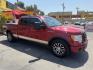 2010 Flame Red /Black Ford F-150 Lariat SuperCrew 5.5-ft. Bed 4WD (1FTFW1EV4AF) with an 5.4L V8 SOHC 24V FFV engine, 4A transmission, located at 801 South State Street, Salt Lake City, UT, 84111, (801) 328-0098, 40.751953, -111.888206 - FX4 package and 4x4. Great condition! Clean title! Low miles for the year! This truck has been regularly serviced and maintained and cared for runs and drives great!!!! Approved for up to a 5 year bumper to bumper warranty that can be added onto the vehicle. Features: 4WD/AWD, ABS Brakes, Air Cond- Photo#3