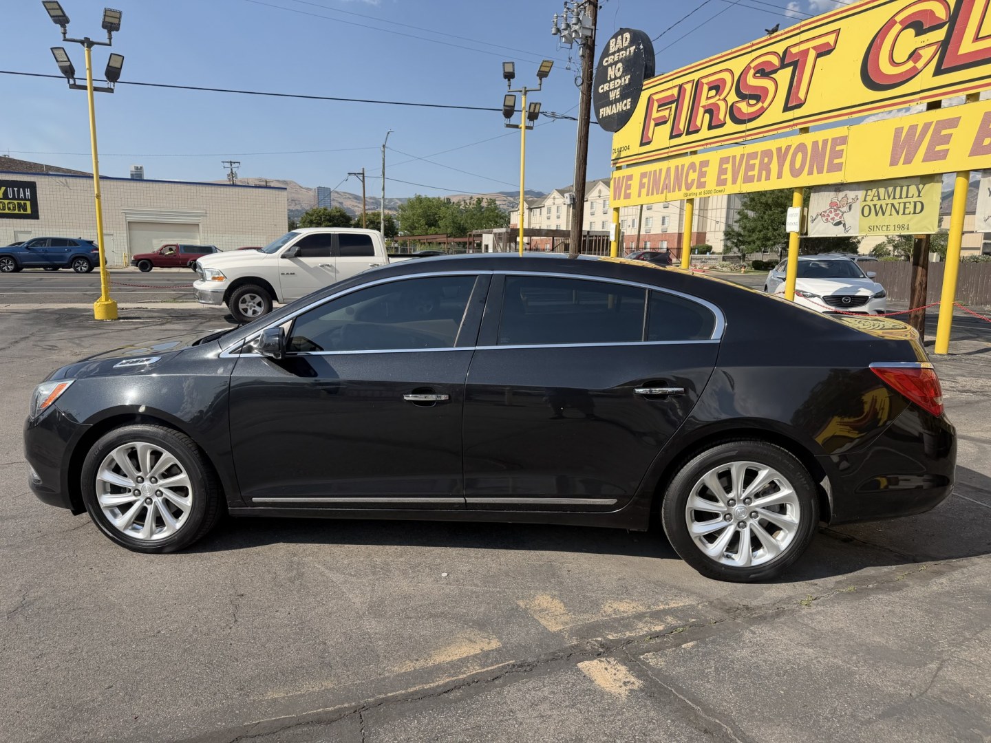 2014 Black /Brown Buick LaCrosse Leather Package (1G4GB5G37EF) with an 3.6L V6 DOHC 24V FFV engine, 6-Speed Automatic transmission, located at 801 South State Street, Salt Lake City, UT, 84111, (801) 328-0098, 40.751953, -111.888206 - Wow immaculate condition inside and out! This is a must see! Low miles only 96,652 that is very low for the year! Come in today and see for yourself how nice this Buick Lacrosse is! Approved for up to a 5 year warranty and passed all inspections! Clean title! Features: Leather-appointed seating,- Photo#7